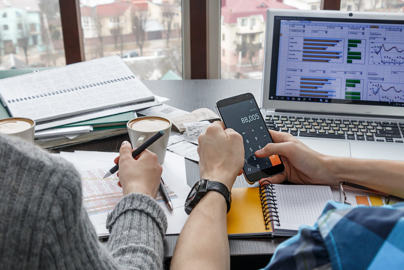 young people at their desk make financial calculat 2022 11 15 02 41 00 utc scaled